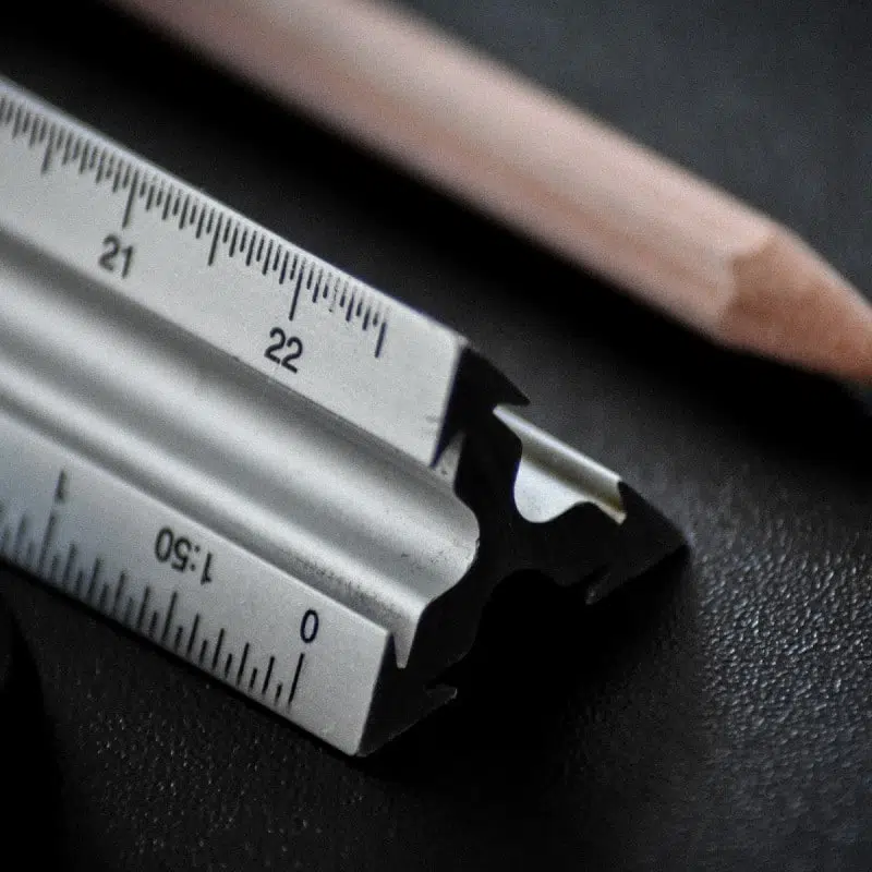 Close-up of a pencil and a ruler